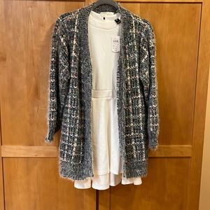 Never worn beautiful lite fluffy sweater perfect for Easter with very colorful.